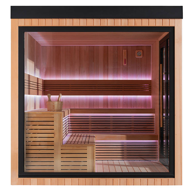 Glasfront der AWT Gartensauna mit klarer Sicht auf den Innenraum und stimmungsvoller rosa Beleuchtung