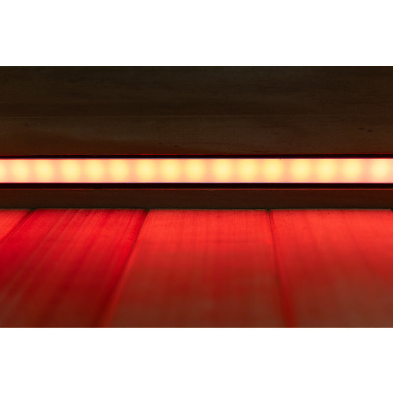 Stimmungsvolles LED-Lichtband unterhalb der Sitzfläche – warmes, indirektes Leuchten in Rot
