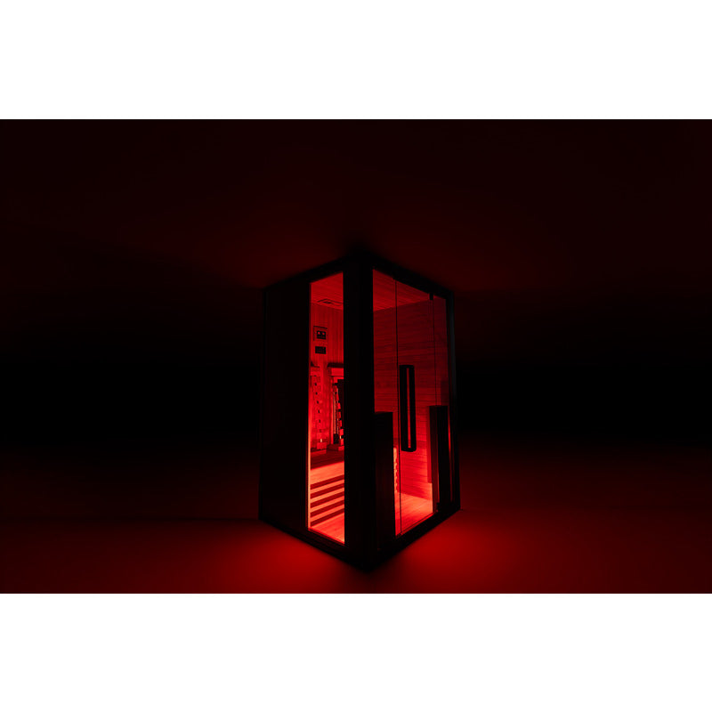 Infrarotkabine in Nachtambiente mit roter Innenbeleuchtung – stimmungsvolle Seitenansicht