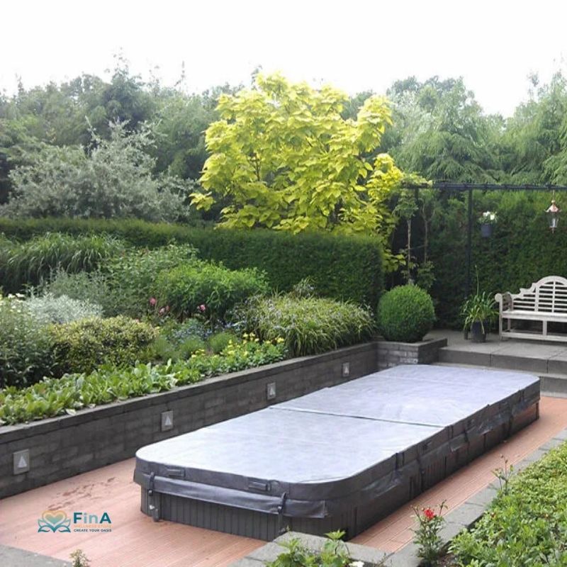 Swim Spa Aquatic 3 von Passion Spas – eingelassener Whirlpool im Garten mit Abdeckung und Naturblick