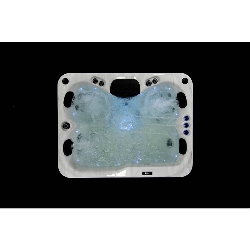 Platinum Spas Tahiti Hot Tub – Draufsicht mit aktivierter Wasserzirkulation und beleuchtetem Becken, zeigt dynamisches Sprudelverhalten und integrierte LED-Spots