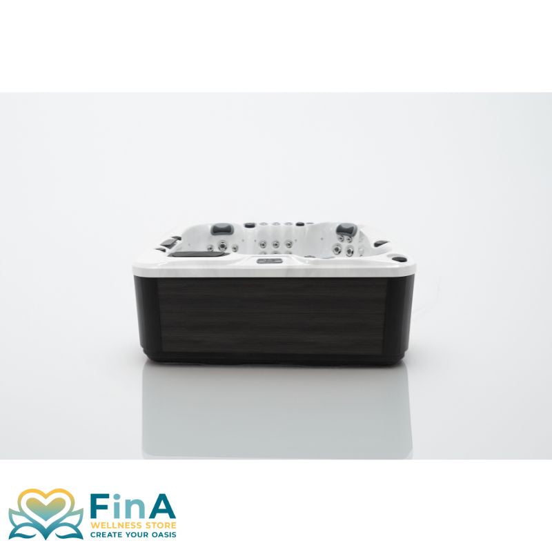 Seitenansicht des FinA Luno Outdoor Whirlpools mit klarer Linienführung, weißer Acrylwanne und grauer Außenverkleidung – modernes Design für stilvolle Outdoorbereiche.