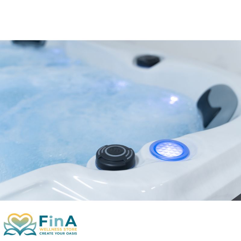Detailansicht eines Sitzplatzes im FinA Luno Whirlpool mit integrierter LED-Beleuchtung und ergonomischer Kopfstütze – stilvolle Verbindung aus Komfort und Funktion.