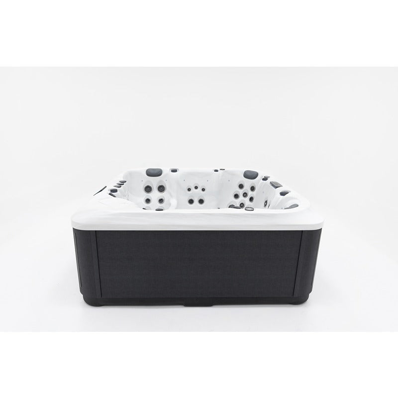 Frontansicht des Platinum Spas Portofino Hot Tubs mit weißem Innenbecken und dunkler EcoTech®-Verkleidung in moderner Optik