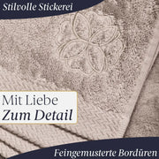 Liebenstein Saunahandtuch mit feinem Blumenmuster in der Ecke, beige Baumwollfrottee mit eleganten Bordüren