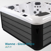JJSpa Alpha 815 Whirlpool mit glänzend weißer Wanne, schwarzem Umrandung und mehreren Massagedüsen, Ansicht von schräg oben