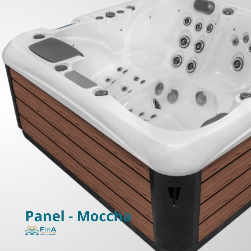 JJSpa Alpha 823A Whirlpool mit weißem Acrylbecken, Holzverkleidung in Nussbaum und zahlreichen Massagedüsen von oben fotografiert