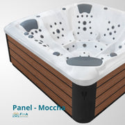 JJSPA Alpha 823 Whirlpool mit weißem Acrylbecken, vier ergonomischen Sitzen mit grauen Kopfstützen und Massagedüsen, umrahmt von Holzverkleidung in Walnussoptik