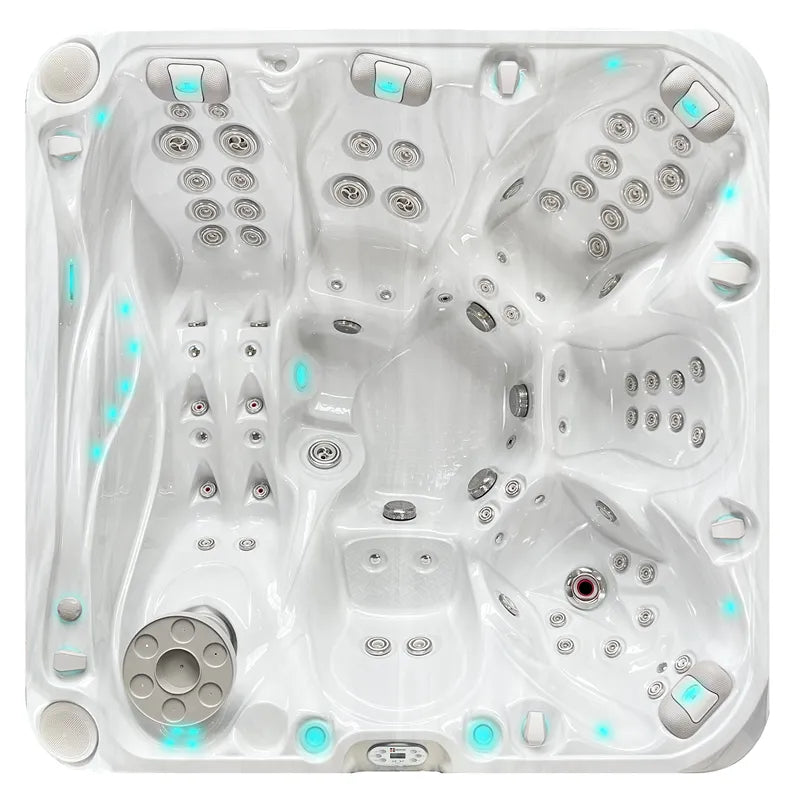 Draufsicht auf den Passion Spas Admire Whirlpool mit weißem Kunststoffgehäuse, zahlreichen Massagedüsen, türkisen LED-Leuchten und Bedienfeldern für 6 Personen