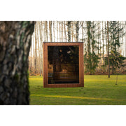 Celsium Jonas Grand Gartensauna mit Glasfront frei stehend im Garten.

