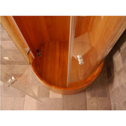 Blumenberg Holz-Duschkabine aus Western Red Cedar, Draufsicht auf die runde Holzkabine mit transparenten Glasscheiben und metallischen Armaturen