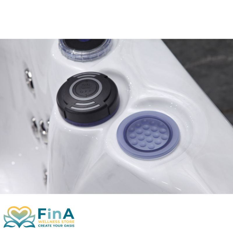 Detailansicht des ON/OFF-Bedienfelds und Luftventils im FinA Fluxera Whirlpool mit griffigem Design