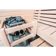 Nahaufnahme des Harvia Vega Compact Saunaofens mit Saunasteinen und umlaufendem Holzschutz in einer kompakten Sauna.