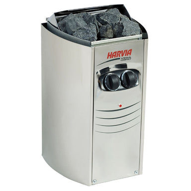 Freistehender Harvia Vega Compact Elektro Saunaofen aus Edelstahl mit Sicht auf die Bedienknöpfe und gefülltem Steinkorb.