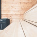 Nahaufnahme des Harvia Virta Combi Saunaofens in einer hochwertigen Saunakabine – klare Linienführung, dezentes Design und harmonisches Zusammenspiel mit hellem Holz.
