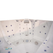 JJSPA Alpha 923 PREMIUM Whirlpool mit Draufsicht auf weiße Wannenform, multiple Massagedüsen, Kopfstütze und Bodensprüher für fünf Personen