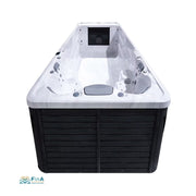 Whirlpool-Swim-Spa JJSpa Alpha 9041 mit weiß-schwarzem Design, Draufsicht auf die offene Badewanne mit Düsen und integriertem Bedienfeld