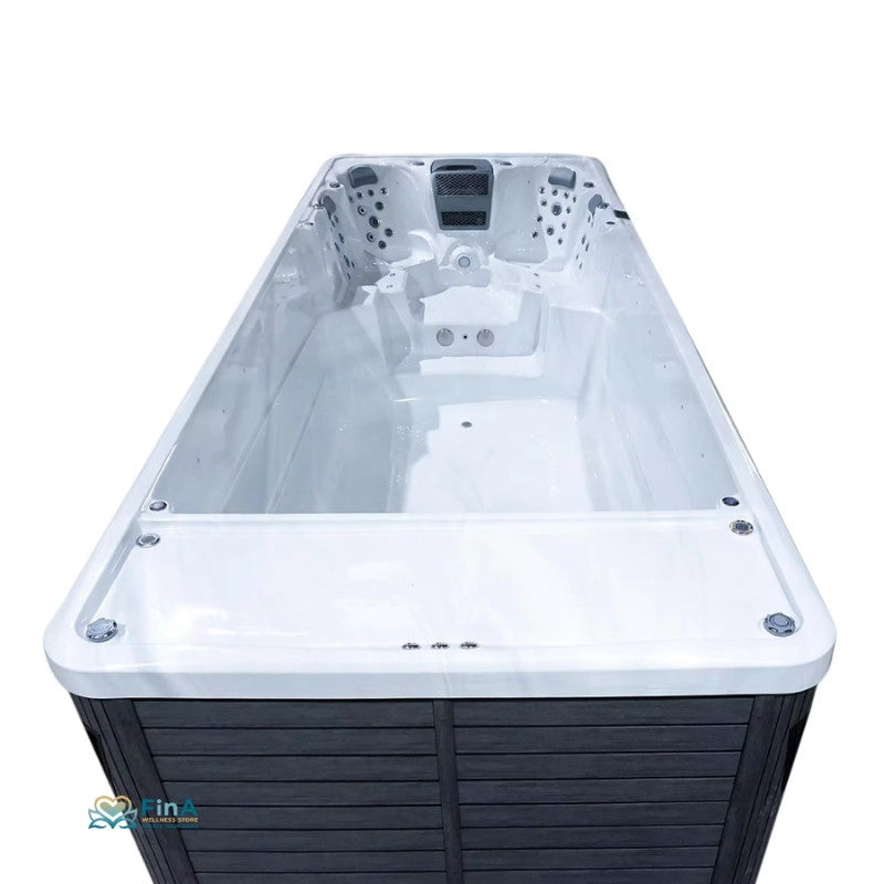 JJSpa Alpha 9041 Swim Spa in Weiß und Schwarz von oben fotografiert, mit sichtbarem Jetbereich und Gegenstromanlage für fünf Personen.