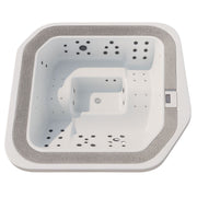 Top-Ansicht des Novellini Moon Outdoor Whirlpools für bis zu 7 Personen mit integrierten Massagedüsen, ergonomischen Sitzen und modernem Bedienfeld – freistehend in elegantem Design mit umlaufendem Gitterrand.