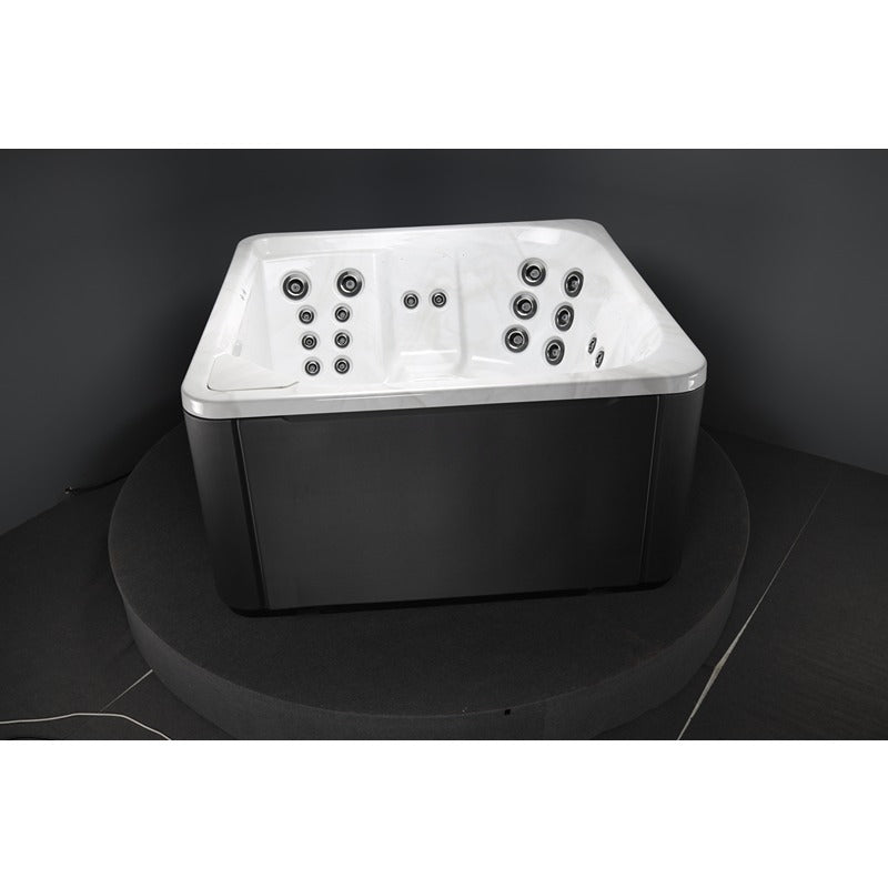 Novitek S-1 Outdoor Whirlpool in Weiß und Schwarz mit mehreren Massagedüsen, Draufsicht auf den 4-Personen-Whirlpool mit rechteckigem Design