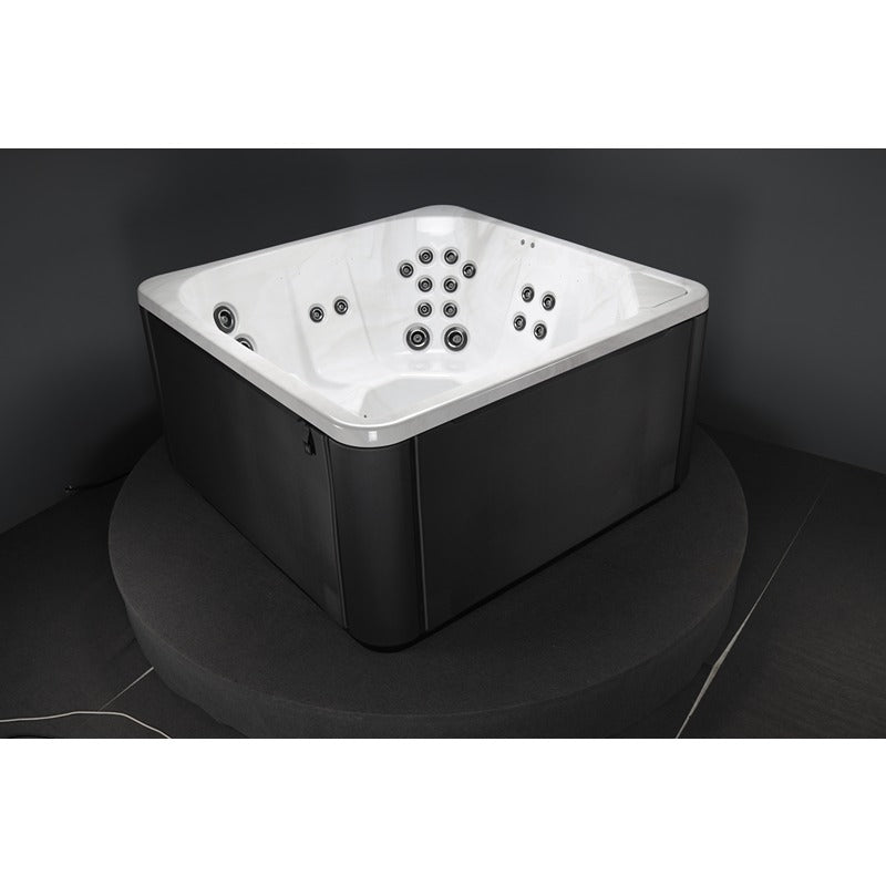 Novitek S-1 Outdoor Whirlpool in Weiß und Schwarz mit quadratischem Design, vielen Massagedüsen und Platz für vier Personen