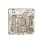 Vogelperspektive eines Passion Spas Retreat Whirlpools mit quadratischem Design, Massagedüsen an den Seiten und blauem Kontrollpanel in der Mitte für 6 Personen.