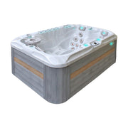 Passion Spas Sensation Outdoor Whirlpool Seitenansicht mit grauer Holzoptik-Verkleidung
