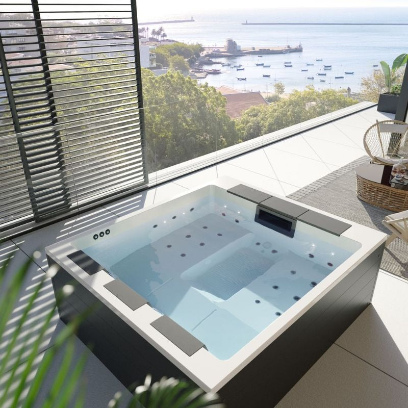 Platinum Spas Lounge Divine Outdoor Whirlpool 220x190x80 mit Lounge-Design auf moderner Dachterrasse