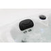 Platinum Spas Tahiti Hot Tub – Nahaufnahme einer gepolsterten Kopfstütze und manueller Steuerung bei laufender Wasserzirkulation für maximalen Komfort im Spa