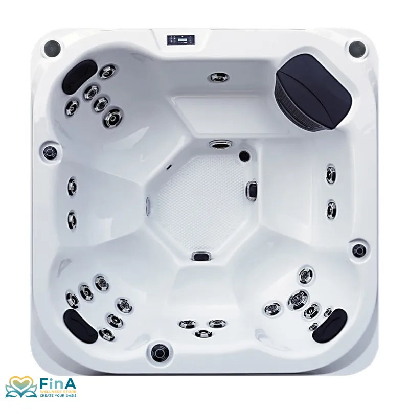 Platinum Spas St Tropez Deluxe Whirlpool – Draufsicht mit 6 ergonomischen Sitzplätzen, 25 Massagedüsen, LED und Bedienfeld, präsentiert von FinA Wellness Store.