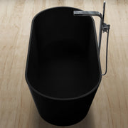 Freistehende schwarze Mineralguss Badewanne EAGO AWT StoneArt BS-553 von oben fotografiert mit Armatur und Ablauf sichtbar