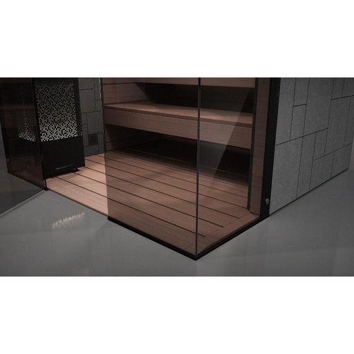 Tylö Reflection Bodenrost WIDE aus hellem Espenholz in moderner Sauna mit Glastür und gemauerten Wänden