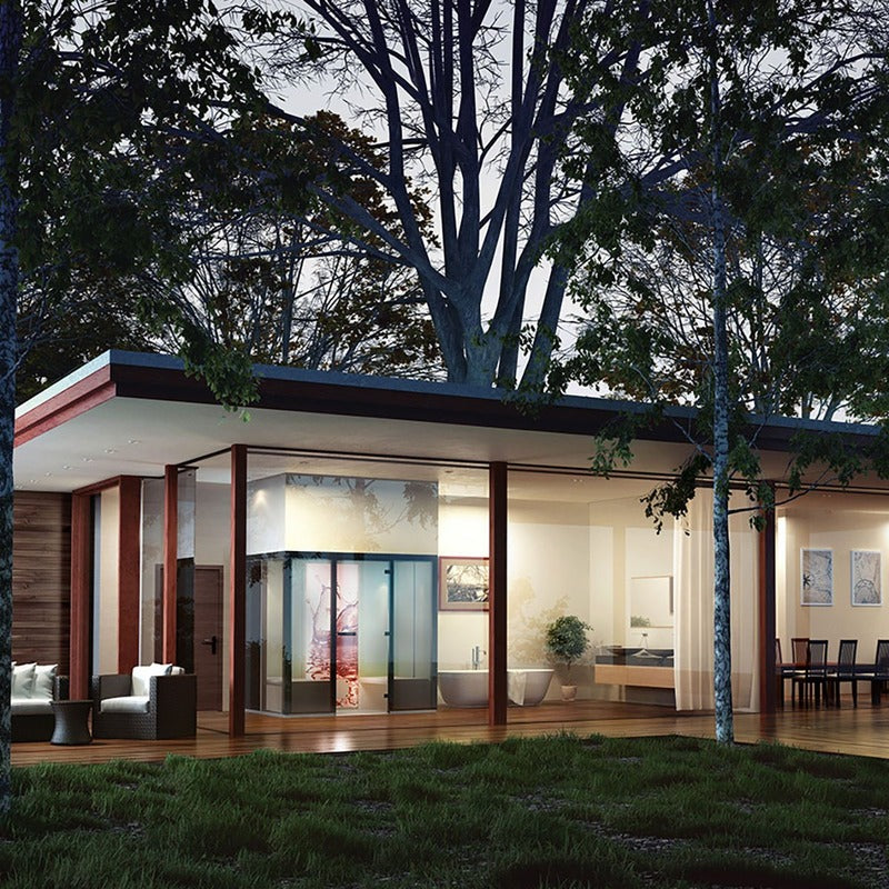 Modernes Wellness-Pavillon mit großen Glasflächen, Holzterrasse und dunklem Dach, umgeben von Bäumen – Tylö Dampfbad Panacea in minimalistischem Design