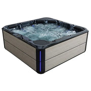 AWT Außenwhirlpool IN-803 extreme 235x235 mit sprudelndem Wasser und schwarzen Massagedüsen