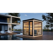 AWT THE CUBE X5-R Hemlock 235x235 Gartensauna mit schwarzem Rahmen auf Holzterrasse neben Pool