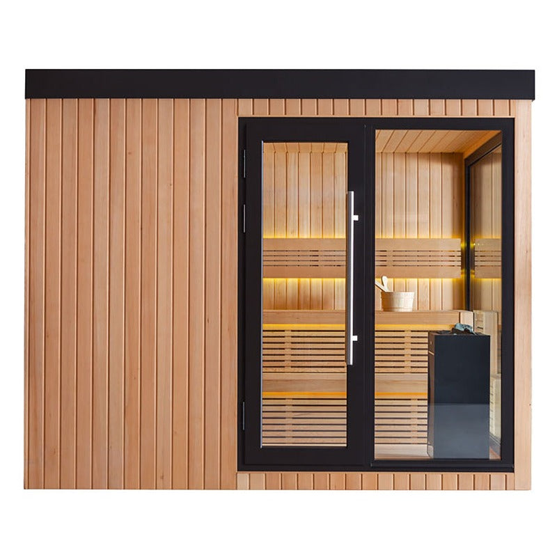 Frontansicht der AWT The Cube X7-L Hemlock Außensauna 300×235 cm mit EOS BiO-Cubo Ofen, Glasfront und warmer gelber LED-Ambientebeleuchtung