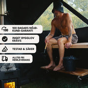 Bast Björk Deluxe Zeltsauna mit Mann in schwarzem Saunazelt, Holzofen mit Feuer, tragbare Gartensauna für 4-10 Personen