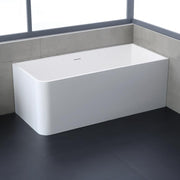 Weiße freistehende Mineralguss Badewanne EAGO AWT StoneArt BS-534 mit abgerundeten Ecken auf dunklem Boden in modernem Badezimmer