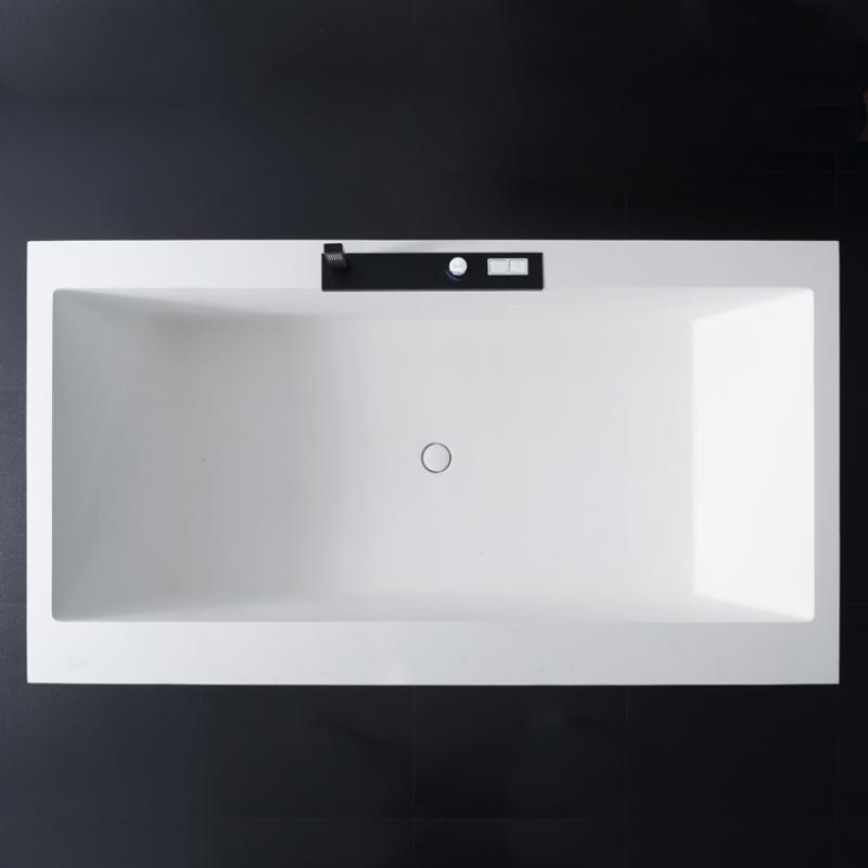 EAGO AWT StoneArt BS-535 freistehende Mineralguss Badewanne in Weiß, Draufsicht auf rechteckige Wanne mit integrierter Armatur und schwarzem Bedienfeld