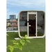 Celsium Ula Small Outdoor Sauna in Weiß mit vollverglaster Frontansicht auf Dachterrasse – moderne Außensauna für urbanes Wellnessambiente