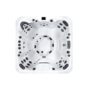  Innenansicht des Colombo Whirlpools mit sieben ergonomisch geformten Sitzplätzen und 48 Massagedüsen – großzügiges Spa-Erlebnis für Gruppen.