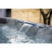 Detailansicht des Colombo Whirlpools mit aktiver Wasserfallfunktion und LED-Beleuchtung – stilvolles Highlight für entspannte Spa-Momente.