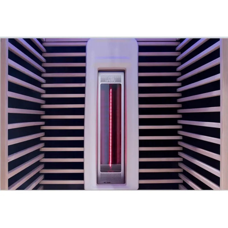 Delta SPA COLORINA full spectrum Infrarotkabine mit aktiviertem roten Infrarotstrahler und Holzbänken im Innenraum