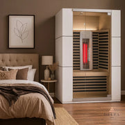 Delta SPA COLORINA full spectrum Infrarot-Sauna mit Glastür und roten Infrarotheizelementen im modernen Schlafzimmer