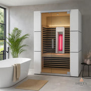 Delta SPA COLORINA full spectrum Infrarotkabine mit rotem Infrarotstrahler und schwarzen Holzleisten im modernen Badezimmer