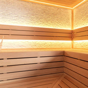 Modernes Saunainneres mit Holzbänken aus Hemlock, warmweißer LED-Beleuchtung und Steinwand in der EAGO AWT E1603A Sauna