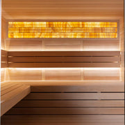 EAGO AWT E1622C Infrarotsauna aus Hemlock-Holz mit gelb leuchtenden Infrarot-Flächenstrahlern und Holzbänken im Innenraum