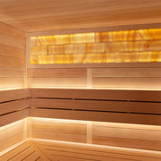AWT E1622C Hemlock Sauna Innenansicht mit Holzbänken, LED-Beleuchtung und Saunaofen im Hintergrund