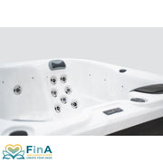 Seitliche Ansicht des FinA Lumari Whirlpools mit Massagedüsen und Kopfstütz