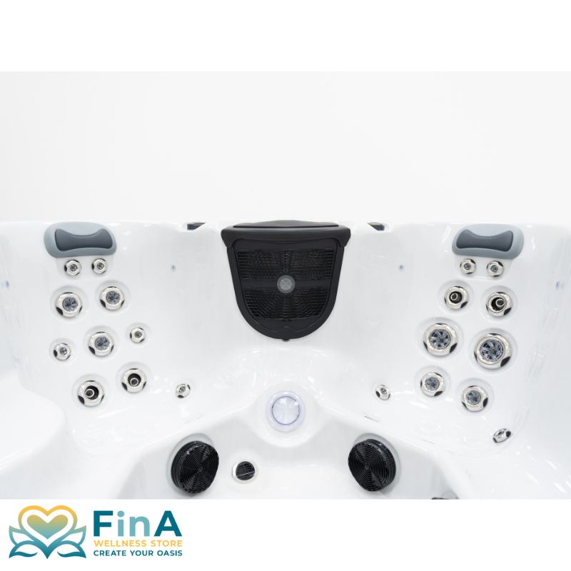 Innenansicht des FinA Soluna Whirlpools mit gezielten Rückenmassagedüsen, Lautsprechern und zentralem Soundmodul für entspannende Klangerlebnisse